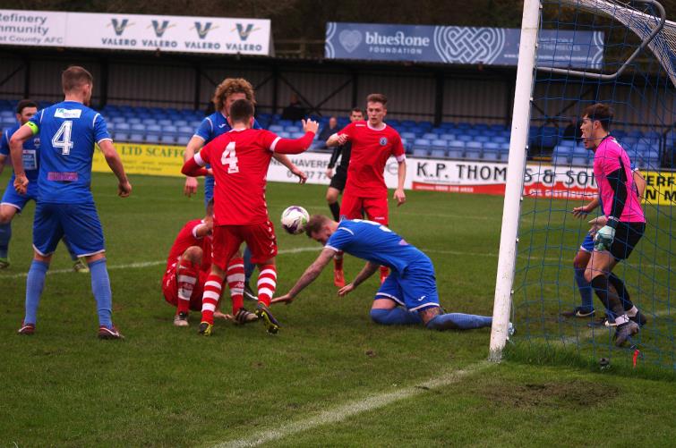 Haverfordwest County centre back Sam Rodon puts his head on the block